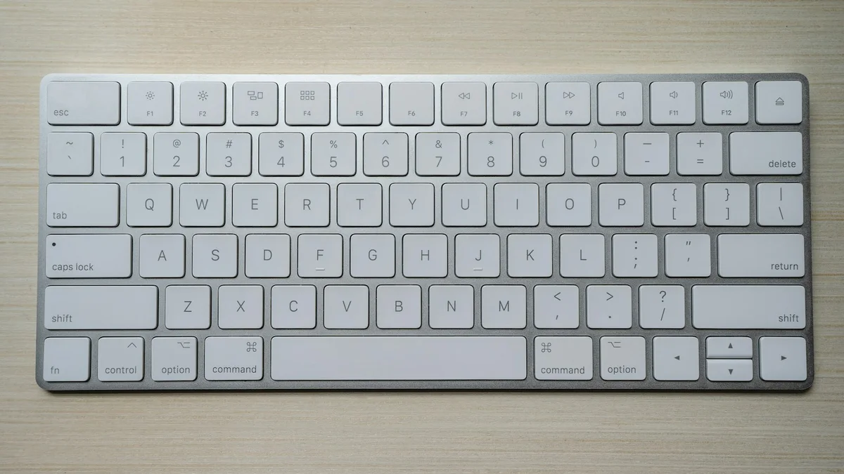 Logitech MX Mechanical wireless keyboard on minimalist desk setup