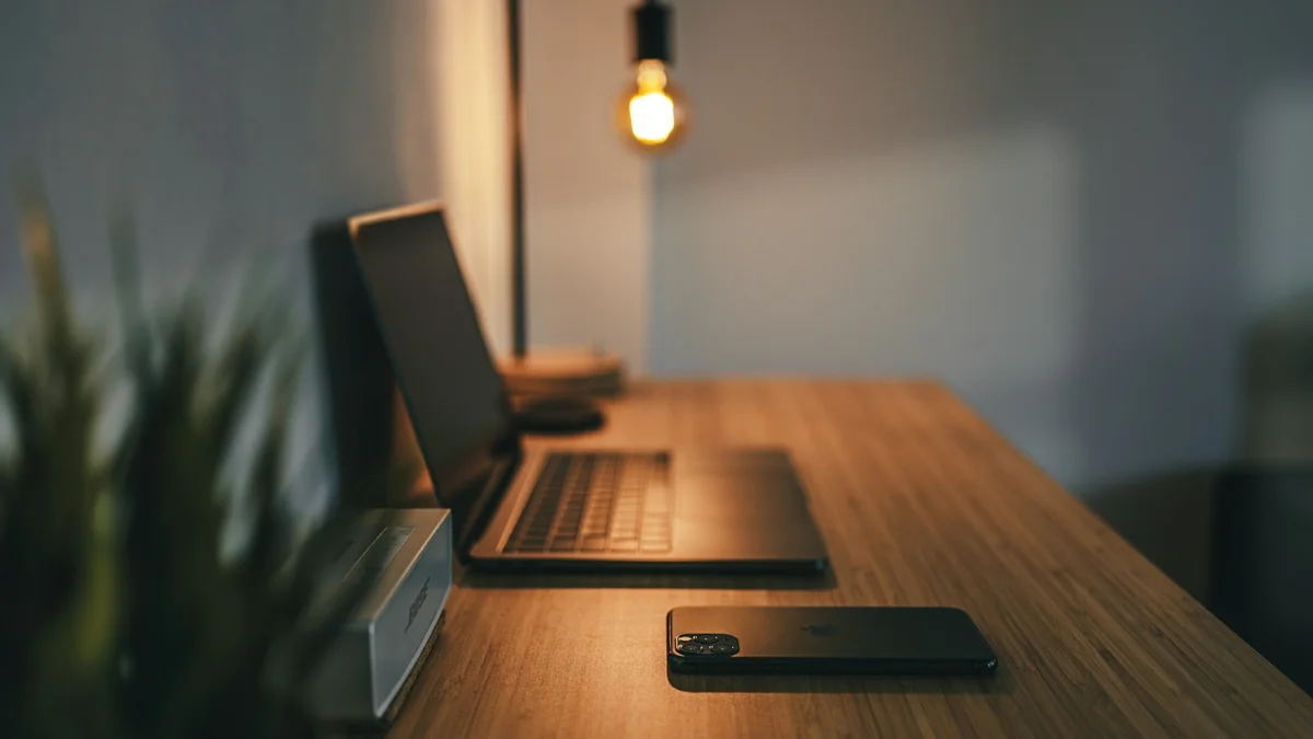 Clean minimalist modern desk setup with completely invisible under-desk wiring