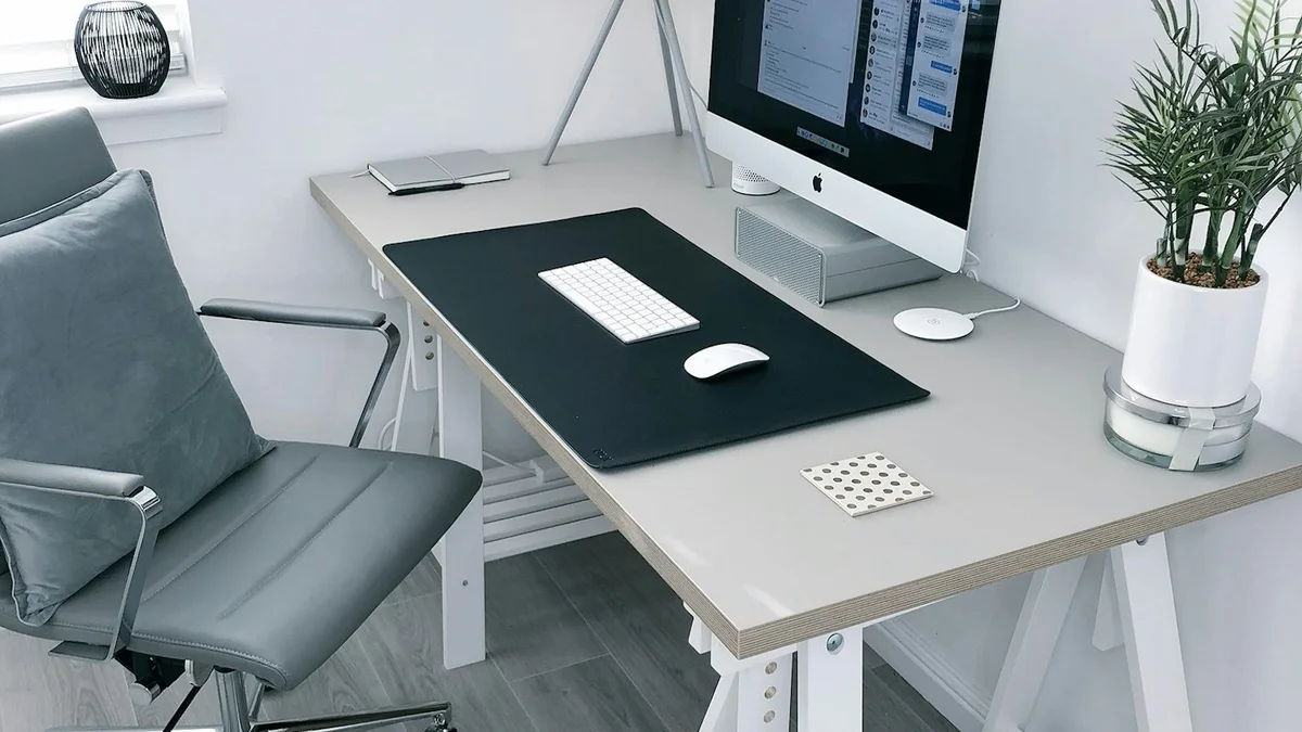 Uplift V2 commercial motorized standing desk inside DeskSpaceLab test lab